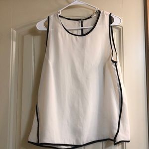 White and black sleeveless blouse